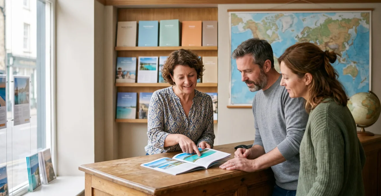 A travel agent showing a printed brochure to two clients at the counter of a travel agency with a world map on the wall.